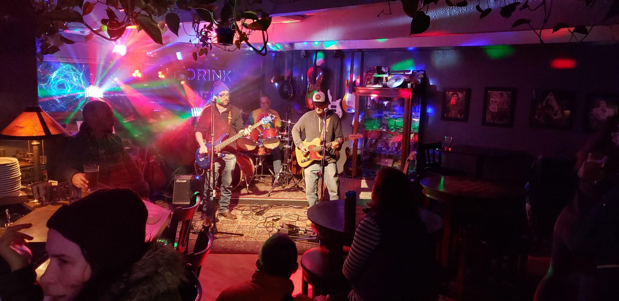 Live band performance at Covert Cafe